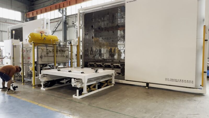 Open WAYEAL helium leak testing vacuum chamber with loading platform for a CDU application